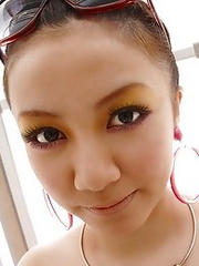 Busty and sexy Japanese av idol Meguru Kosaka strips naked and shows her amazing body