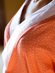 Lovely and tanned Japanese av idol Nami Hoshino shows her amazing naked body