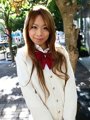 Remika Uehara poses on the street