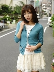 Juri Kitahara in blue sweater and lace skirt