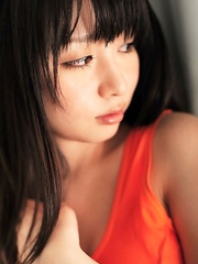 Megumi Suzumoto with big boobs in orange bath suit loves sports