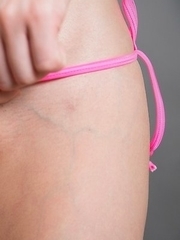 Ena Nishino poses in the skimpiest bikini and then fingers herself a lot