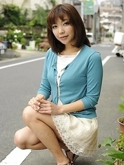 Juri Kitahara in blue sweater and lace skirt
