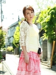 Asian Chika Sasaki in pink and yellow outfit